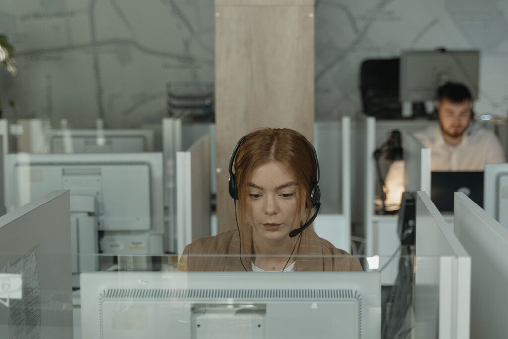 A woman providing virtual receptionist services to a law practice.